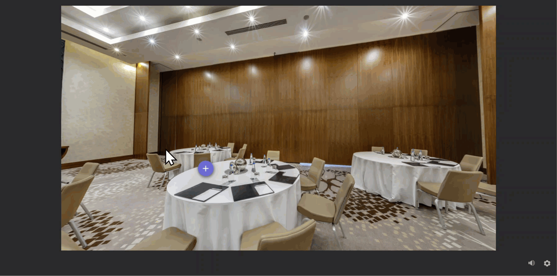 Animation of a marker being selected on a 360° image of a conference room that opens a layer. The following paragraph describes the interaction.