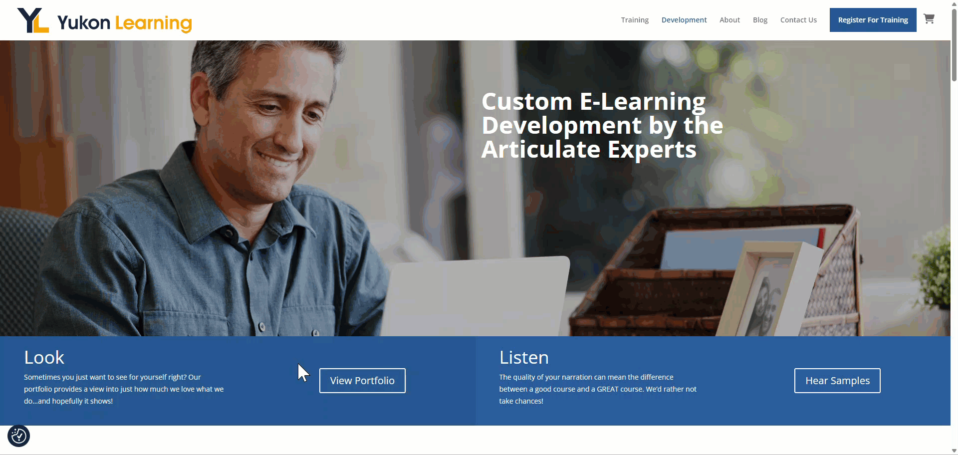 Yukon Learning webpage with a blue "View Portfolio" button that grows and changes color when a mouse hovers over it.